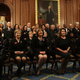 House Democrats pose in their funereal best. Photo via Getty.